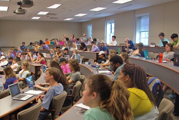 students looking toward speaker during presentation