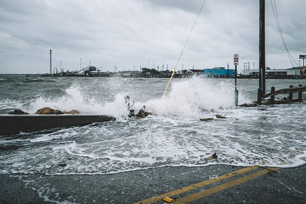 Water crashing over bridge during Hurricane Harvey