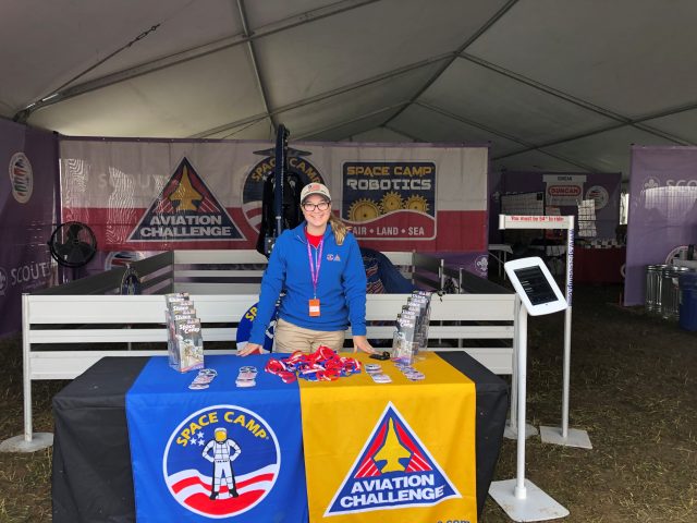 Emily Hildebrand in West Virginia on a sales trip to work the Multi Axis Trainer at the 24th Annual World Scout Jamboree.