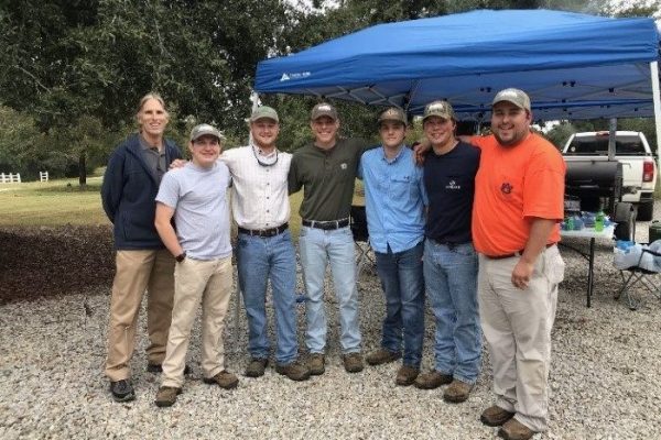 Forestry Club faculty advisor Dr. Tom Gallagher stands with club members Heath Williamson, George Lash, Will Sellers, Cristian Bass, Tommy Kendrick, and elected Log-A-Load chair Thomas Gilpin at the event.
