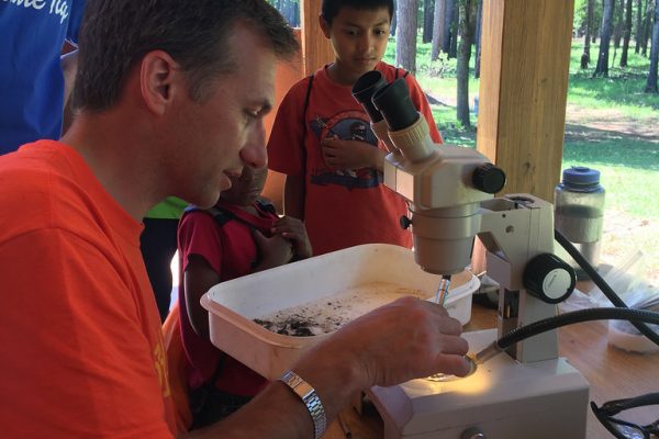 Auburn University Department of Biological Sciences' Assistant Research Professor and Invertebrate Collections Manager Brian Helms demonstrates the use of a microscope to identify invertebrates during the BioBlitz held at the Mary Olive Thomas Demonstration Forest in Auburn on April 23.