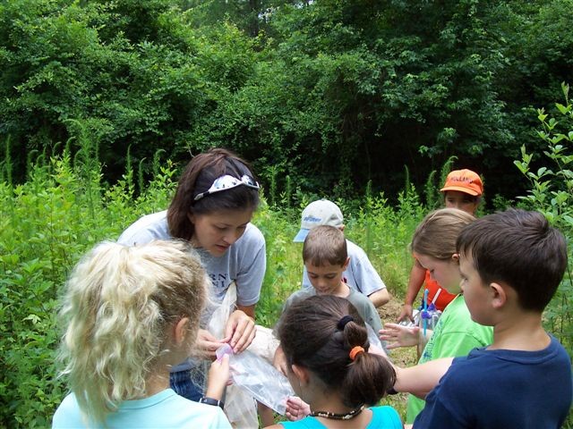 student leads discovery hike