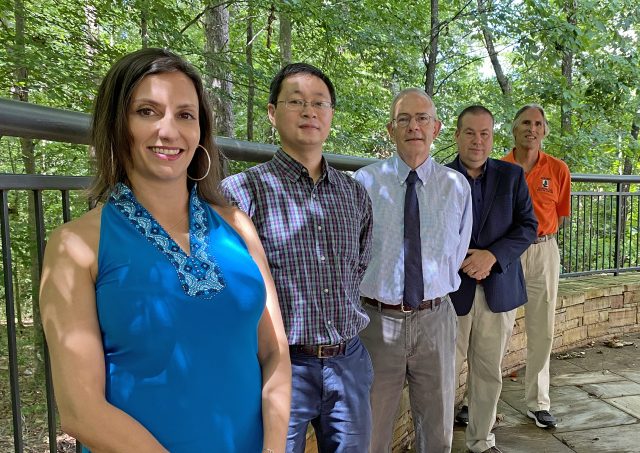 A federal appropriation to the U.S. Forest Service to develop new methods of retrieving and utilize downed timber from hurricanes will be coordinated by Graeme Lockaby, third from left, the Clinton-McClure Professor in Auburn’s School of Forestry and Wildlife Sciences, and allocated to four Auburn research teams led by faculty members, from left to right: Sole Peresin, assistant professor of forest biomaterials; Yucheng Peng, assistant professor of sustainable packaging systems; Brian Via, the Regions Professor of Forest Products; and Tom Gallagher, the Regions Professor of Forest Operations.