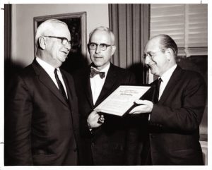 President R.B. Draughon, Head Professor W. B. DeVall, and C.H. Cantrell, director of the Auburn University Library receive certificate from the Forest History Society