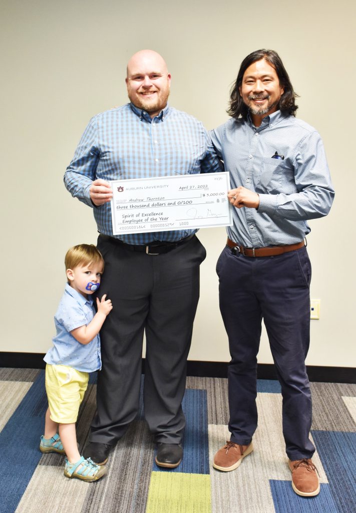 Andrew Thornton, son Harrison, and manager, James Fukai