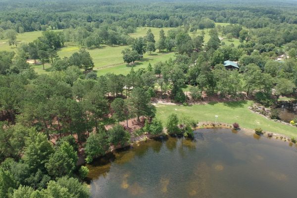 An aerial photo of Crooked Oaks. Located in Notasulga, Alabama, the 415-acre farm property includes Dye’s main house, a guest cabin, lodge, pavilion, gazebo, two barns and a nursery office. (Photo courtesy of Crooked Oaks Farm)