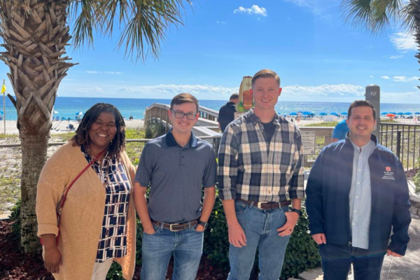 Michelle Cole, students J.P. Thomasson and Dalton Williams and assistant CFWE professor and Extension specialist Georgios Arseniou at the Alabama Urban Forestry Association conference in Orange Beach, Alabama.