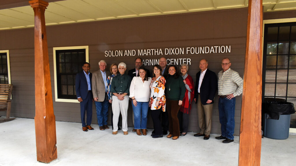 Auburn and CFWE leadership, Dixon Foundation members, and center staff gather for a photo.