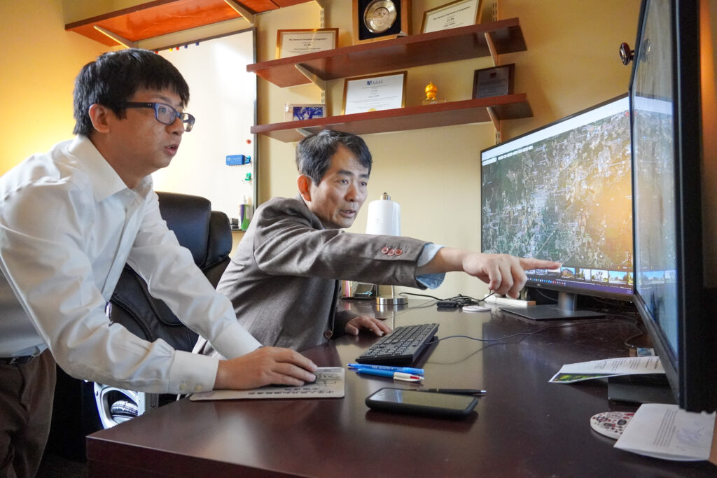 Zutao Yan, and Li An survey satellite imagery maps together.