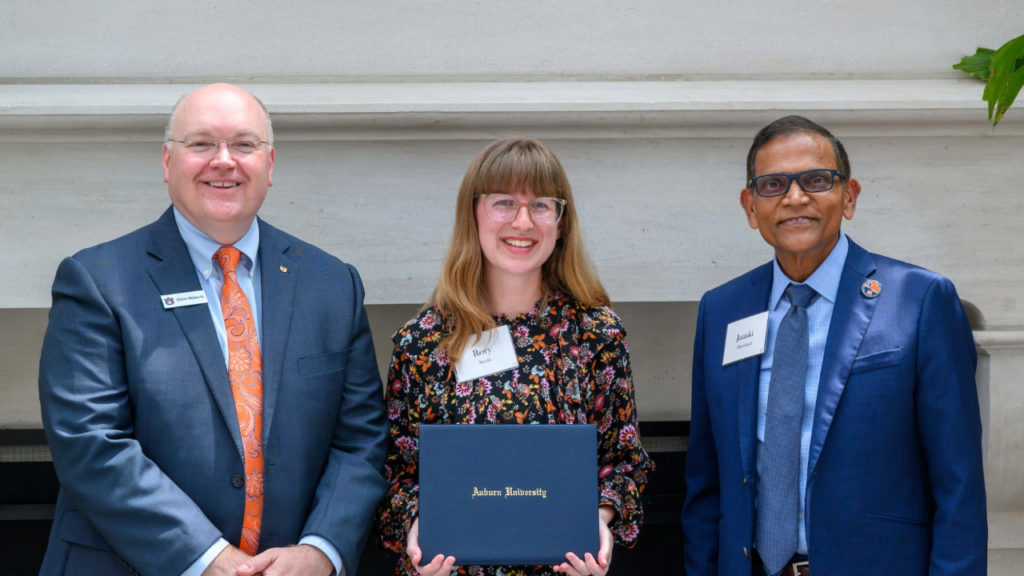 Left to right: Auburn University President Christopher Roberts, Rory Grace Smith, and Emmett F. Thompson Dean Janaki Alavalapati at the President' Luncheon