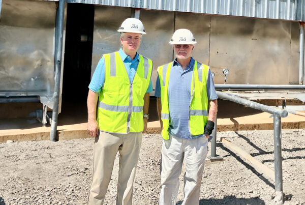 Douglas Ziebach stand with his father, Elmo Ziebach at a forestry operation site.