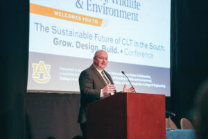 Auburn University President Christopher B. Roberts addresses attendees at the 2024 Auburn CLT Conference.