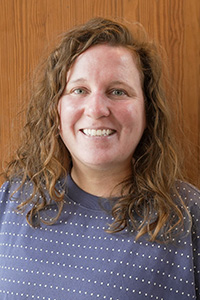 Molly Simonis poses for a headshot photo.