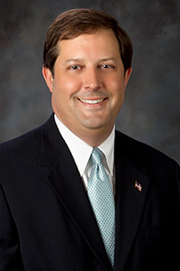 Kevin Savoy poses for a headshot photo.