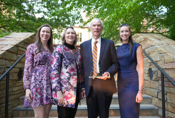 Joe Twardy and family standing on steps at the CFWE Awards ceremony