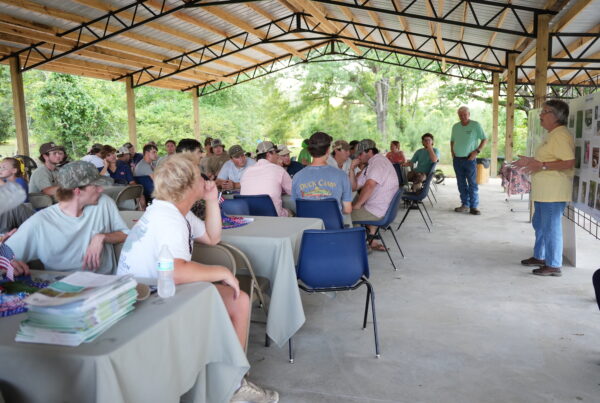 Gail Jones speaks to forestry students at her farm