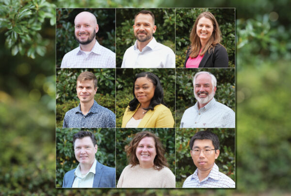 A collage of faculty headshots in a 3 by 3 grid overlayed on a green background.
