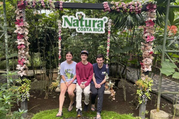 Students posing for a photo on a swing in Costa Rica.