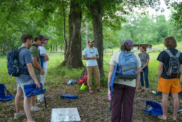 Students gathered outside to learn about leaving no trace.