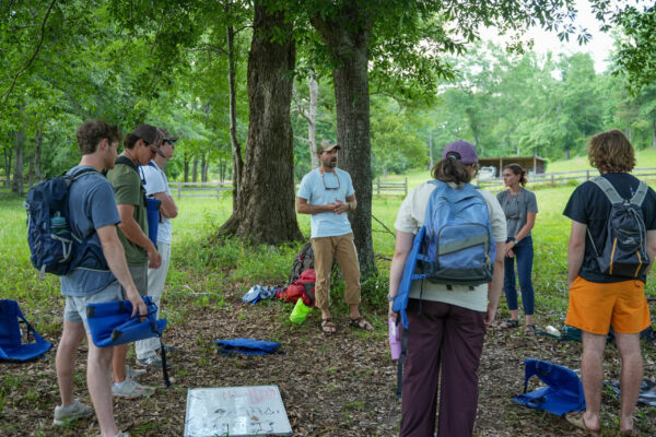 Students gathered outside to learn about leaving no trace.