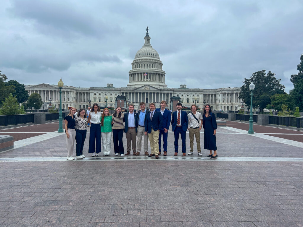 The CFWE FEWL Academy poses in front of the U.S. Capitol