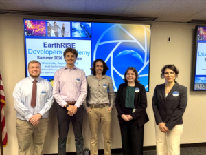 A group of NASA interns, including Sid Warren, pose for a photo in an EarthRise Developers Academy office.